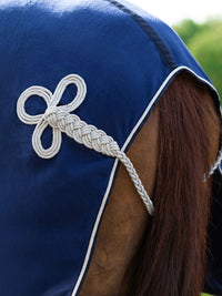 Fleecetäcke Med Silverfläta Marin/Silver